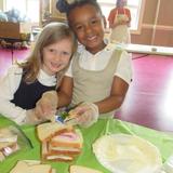 Weddington Christian Academy Photo #4 - 1st Grade students preparing sandwiches for Urban Ministries in February 2020.