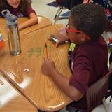 Faith Lutheran Academy Photo #7 - 3rd graders mastering regrouping in Math.