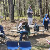 East Burke School Photo #8 - Literature is alive. Sometimes it's good to sit still and read literature--but when it's a beautiful day and we're reading some comedic theatre? That calls for setting up chairs and tables as a stage, casting the roles, and acting outdoors.