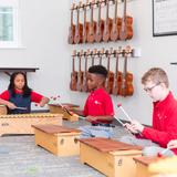 Elijah House Academy Photo #5 - In addition to a rich core curriculum, our students learn to speak Spanish, perform and compose music, create beautiful art, and develop coordination and stamina in physical education.