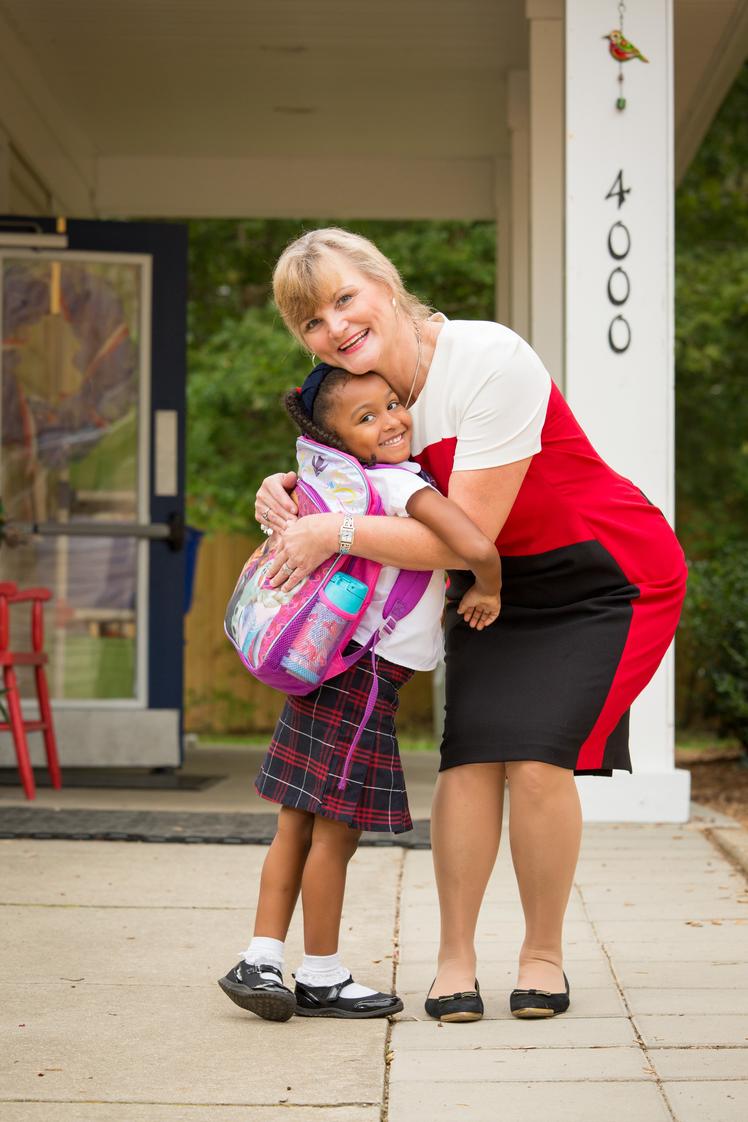 Providence Classical School Photo - Our headmaster, Susan Oweis, greets students every morning and interacts with them throughout the school day. Her office is a popular spot for student visits. Every student is known and loved.