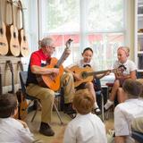 Providence Classical School Photo #5 - Providence Classical School has a rich visual and musical arts program. The study of music and art frequently complements the historical study taking place in each grade. PCS also has a new music lab complete with a recording studio.