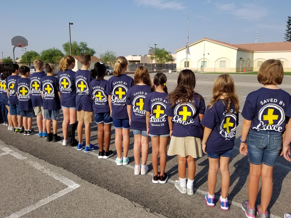 Lamb Of God Lutheran School Photo #1 - The Lamb of God students are wearing their 2018 Spirit shirts each Friday! Our School Theme is "Saved by Grace", from Ephesians 2:8.