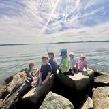 Quest Montessori School Photo #4 - Our Third Year students engage in a year-long study of the Narragansett Bay. The study progresses from learning about sea life in the Bay to how the Bay met the fundamental needs of the Pequot tribe. Throughout the year the children take several daily trips to local working farms, bird sanctuary, wildlife preserve and an oyster farm.