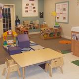 Knowledge Beginnings Photo #6 - Our youg toddler room gives our transitioning babies lots of fun activities at their level as they gradually stabilize on their feet.