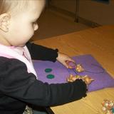 Mundelein KinderCare Photo #2 - Age-appropriate activities and materials help your child master important learning concepts - here we are learning to count to 2!