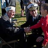 Rockbridge Academy Photo #3 - First grade student is introduced to local WWII Pearl Harbor survivor at Rockbridge Academy's Veteran Ceremony