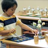 Leport Montessori Irvine Westpark Photo #8 - Montessori preschooler learning numbers to 20