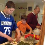 Plumfield Academy Photo #1 - Students regularly participate in school-wide celebrations for holidays and other special occasions. Here, young boys spend time in the kitchen, learning about meal preparation by preparing the meal for the whole school to eat together.