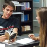 University Christian High School Photo #4 - Students reviewing school-wide read, "The Warrior's Heart" by Eric Greitens.