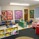 KinderCare Old Salem Photo #4 - Toddler & Discovery Preschool Language Room - Your child will rotate into three classrooms designed for learning & fun.