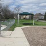 Farmington Hills KinderCare Photo #7 - Our large fenced in playground allows for great large motor outdoor experiences.