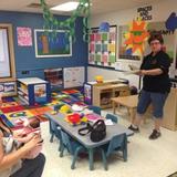 Fishers Roberts Dr. KinderCare Photo #10 - Ms. Terry explaining our fall curriculum to a parent at our curriculum preview night