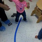 Woodridge South KinderCare Photo #6 - Amiah had fun trying to balance and walk a curved line in our toddler room.