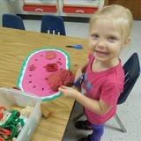 New Lenox KinderCare Photo #9 - In Preschool, playdough is a great way to introduce the use of scissors.