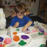 Telegraph Road KinderCare Photo #9 - Bubble wrap painting fun in the Preschool classroom.