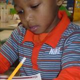 Emerald Wood KinderCare Photo #7 - Working in our Spanish journals.