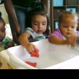 Matteson KinderCare Photo #10 - Babies playing in the water table during water play.