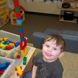 Prairie View KinderCare Photo #5 - Using our imagination to build with legos!