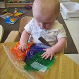 Kensington KinderCare Photo #3 - Our infants are provided with tactile experiences to enhance not only fine motor skills, but cognitive development.