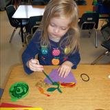 Highland KinderCare Photo #9 - Expressing herself through art and working on her small motor skills.
