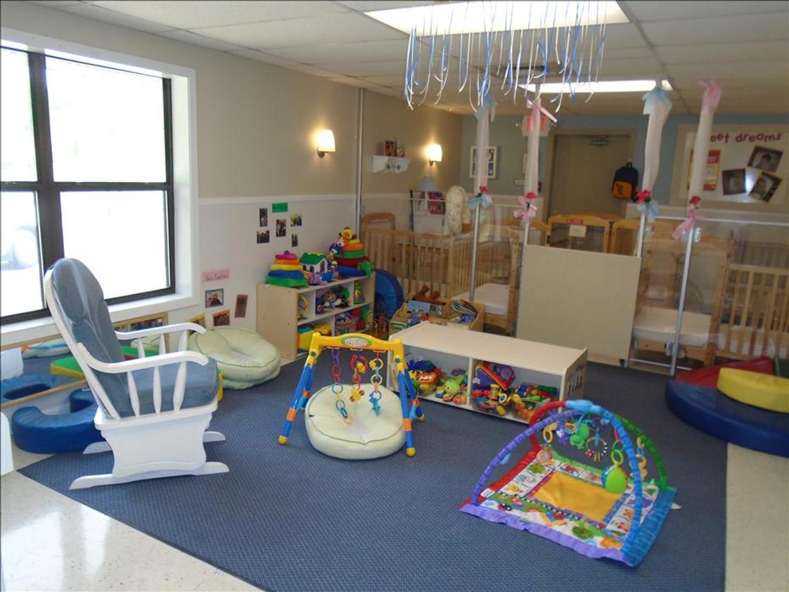 Kenrick Avenue KinderCare Photo #1 - Infant A is for our non-mobile Infants. In this room, we have many floor mobiles and other activites to keep your child stimulated during the day. Once they start to crawl and/or walk, they will transition to the Infant B Classroom. In this classroom, the teachers follow the exact schedule you are wanting for your Infant.