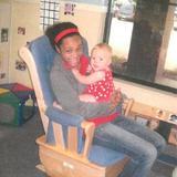 Country Club KinderCare Photo #10 - One on one interaction in the Infants Classroom