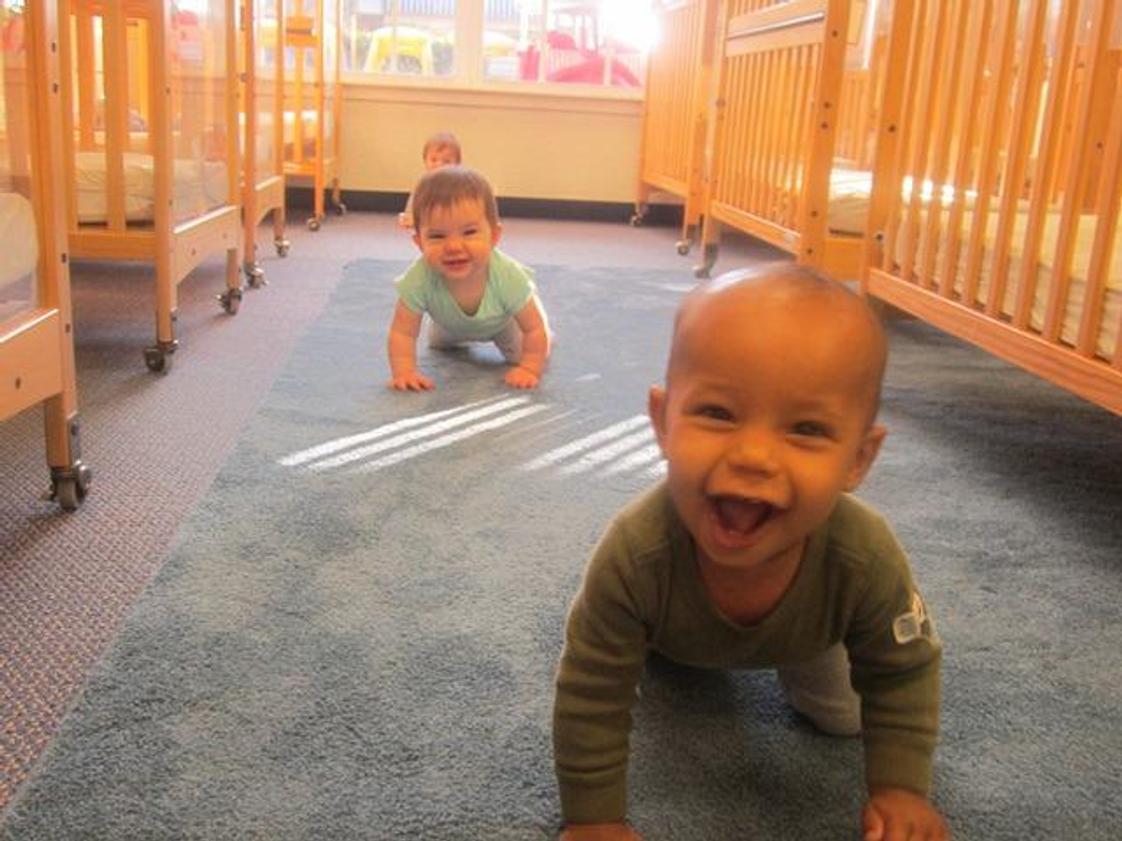 Deerwood KinderCare Photo #1 - Babies are crawling with excitment around the Infant room