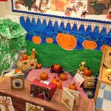 Shelton KinderCare Photo #5 - In our center the teachers and children will create new, eduacational and fun learning environments based on the curriculum they will be learning about. This is one example of how they transformed their dramatic play into a pumpkin patch, while exploring pumpkins gords and so much more.
