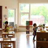 Hollis Montessori School Photo #3 - Each airy classroom is light-filled from the large south-facing windows and includes natural materials and a dedicated kitchen area. All of the classrooms open directly to outdoor classroom space, gardens, and play areas.