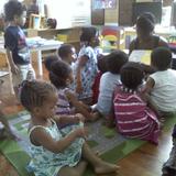 Nsoroma Academy for Holistic Thought Photo #2 - Our youngest learners enjoy one of their favorites times of the day: "Akoma Reading Circle!"