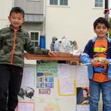 Riverbend School Photo #4 - Students presenting at the International Festival