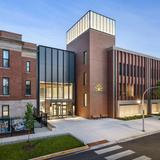 Chicago Jesuit Academy Photo #5 - CJA's existing building (the old Resurrection Parish building, on the left) combines with the new addition, and has entrances on both Jackson Blvd. and Quincy Ave. CJA also borders Moore Park, so our students have a lovely area for recess and team sports.