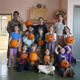 Brooklyn Waldorf School Photo #19 - Eighth graders pumpkin carving with their first grade buddies!