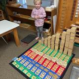 Christian Montessori Academy Photo #13 - A student has worked very hard placing numbers and beads in the correct place value as an introduction to the decimal system. This work, called the 45 layout, is a favorite in Children's House.