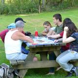 The Highland School Photo #4 - Playing board games at the school yard picnic table.