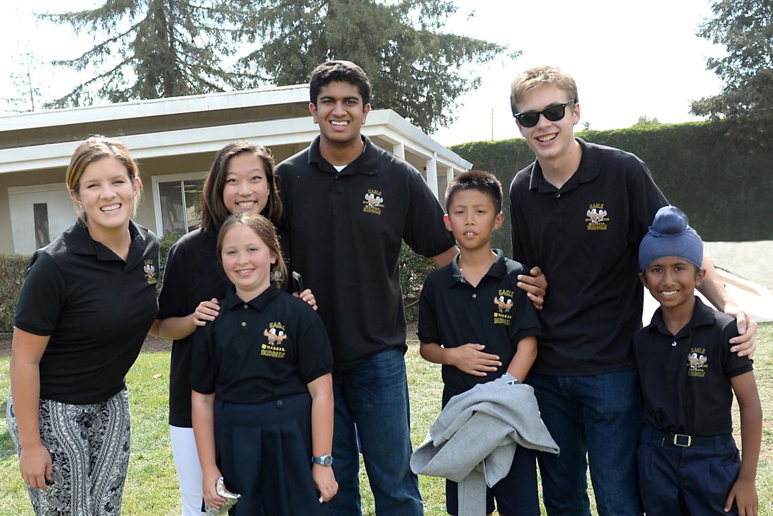 The Harker School Upper School Photo - Harker's Eagle Buddies program matches upper school students with lower school students for three years. The buddies meet 3 times per year for fun and food!