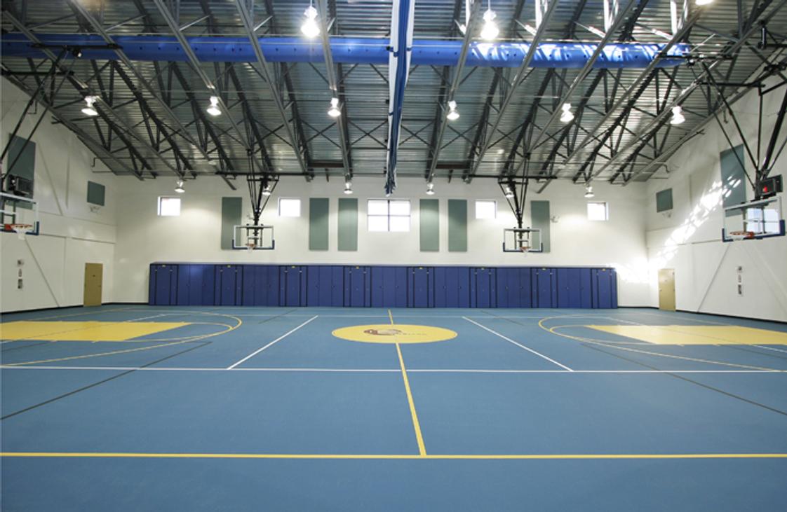 The Quarry Lane School Photo - Our state-of-the-art gymnasium is used for Physical Education classes, as well as hosting a variety of sports, including Basketball, Volleyball, Badminton and Futsal.