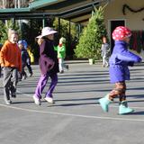 Waldorf School Of The Peninsula Photo #6 - Kindergarten children skipping to their classroom on a December morning.