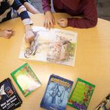 Walden Community School Photo #6 - Small-group reading time fosters collaboration and a love of stories as students explore books that connect to their learning units.