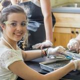 Chrysalis School Photo #5 - Teachers utilize hands on learning as much as possible. Here biology students are dissecting frogs.
