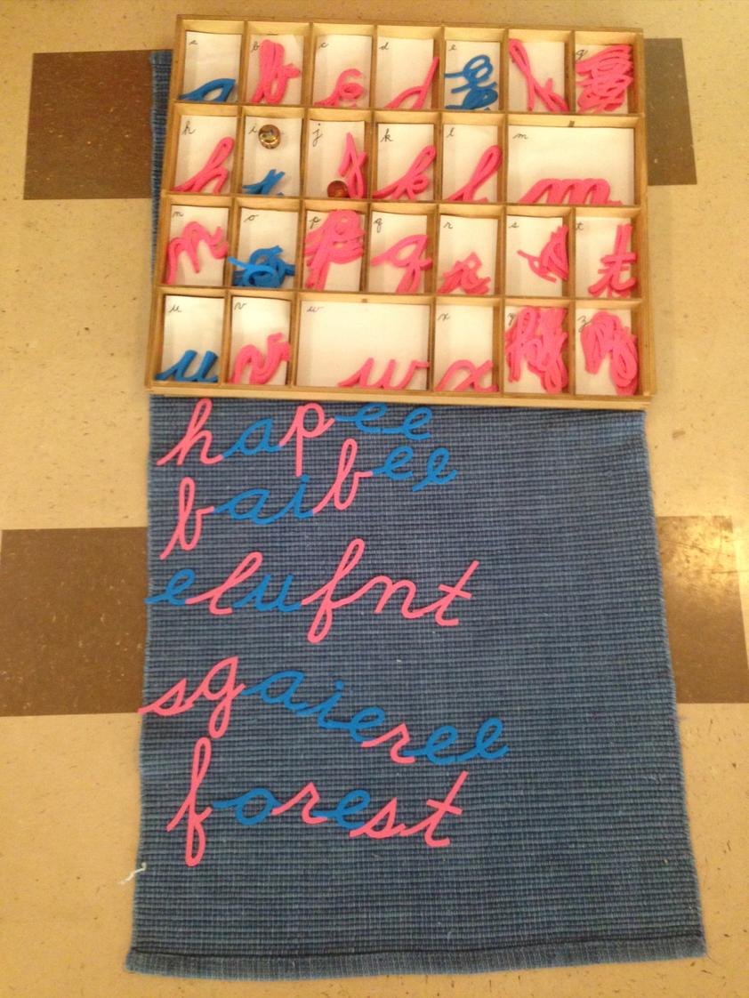 Puddletown Montessori School Photo - moveable alphabet:happybabyelephantscaryforest