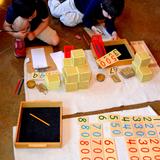 Lake Hills Montessori Austin Campus Photo #2 - Using the Golden Beads method is the best way to practice advanced math.