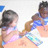 Jones Road KinderCare Photo #7 - Painting in our Toddler Room