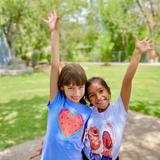 Mountain West Montessori Photo #6 - Happy friends enjoying each other and the garden!