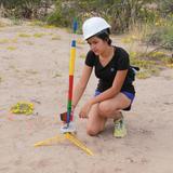 Las Cruces Academy Photo #9 - Eighth-grader Xitlali preparing a rocket for experiments on altitude related to engine impulse, out on BLM land