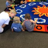 New Covenant Lutheran School Photo #2 - Fun in the Minnows class this am~! It's a new program for two year old and their caregiver(mom, dad, grandparent, nanny, etc)....its been a real hit with both kiddos and adults alike:)