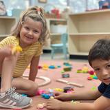 Country Day Montessori School at Carrollwood Photo #2 - Montessori programming ensures our students are developing fundamental skills - even while they learn through play! Our prepared environment helps them make creative choices through collaborative play.