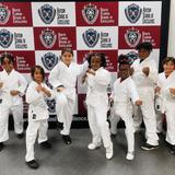 South Florida School of Excellence Photo #17 - School's incorporates all the protocol and discipline of a more traditional martial arts studio, but in a unique and fun manner for our students. The physical benefits are profound, as children practice kicking, punching, blocking, yelling, stretching, running and jumping during each interactive class. The program is progressive, using belt promotions as the strong motivator.