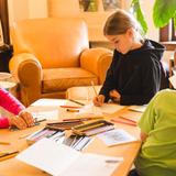 Prairie School of DuPage Photo #3 - Students work on illustrations for their bird books.